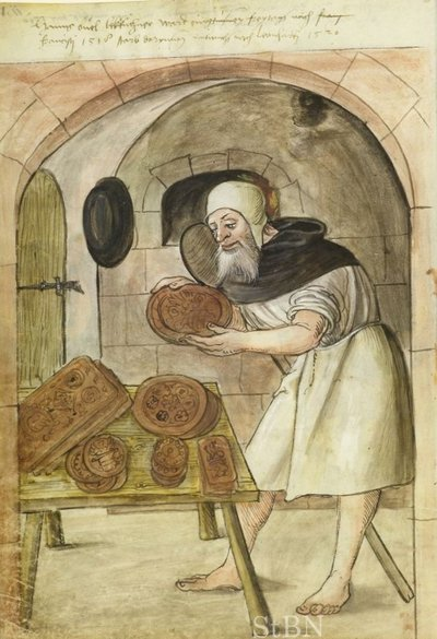 cook making cookies in medieval times